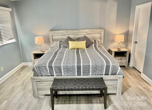 bedroom featuring light wood-type flooring