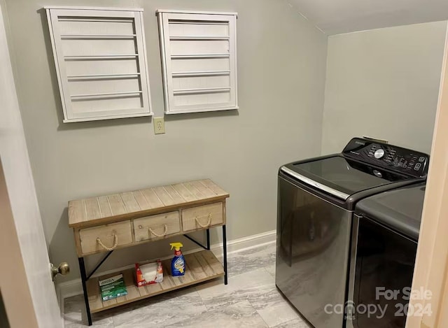 laundry room with washer and dryer