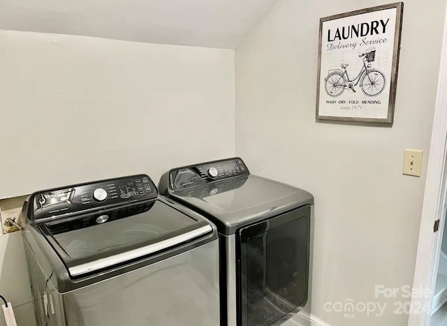 laundry area featuring washer and clothes dryer