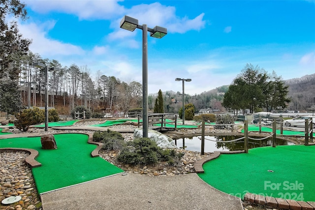 surrounding community featuring a mountain view