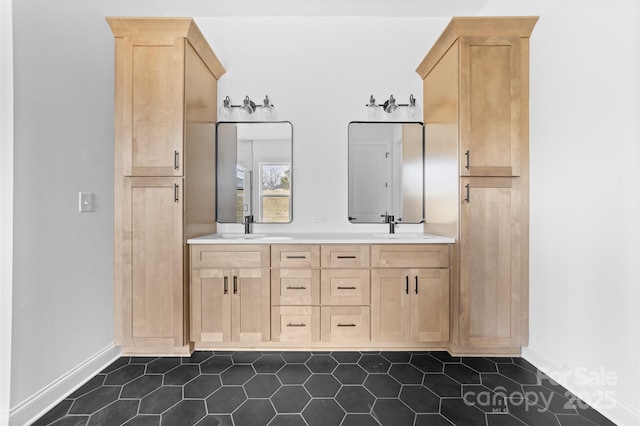 bathroom with vanity and tile patterned flooring