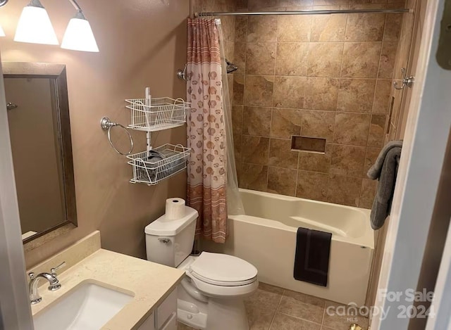 full bathroom with toilet, shower / tub combo with curtain, vanity, and tile patterned flooring