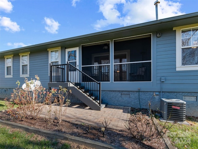 view of front of home featuring central AC unit