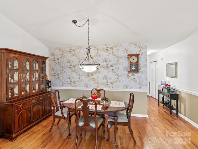 dining area with light hardwood / wood-style floors