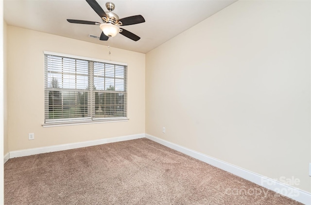 carpeted empty room with ceiling fan