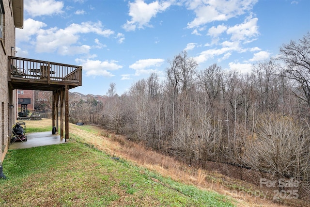 view of yard featuring a deck