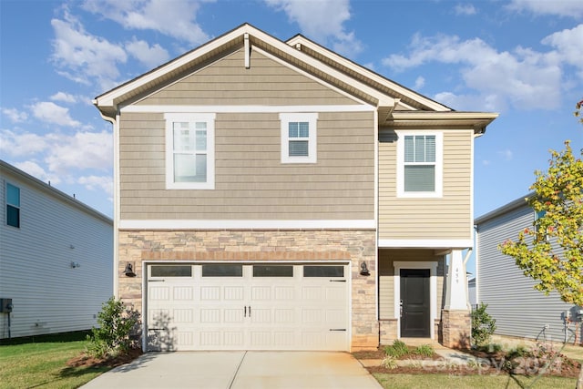 craftsman house featuring a garage