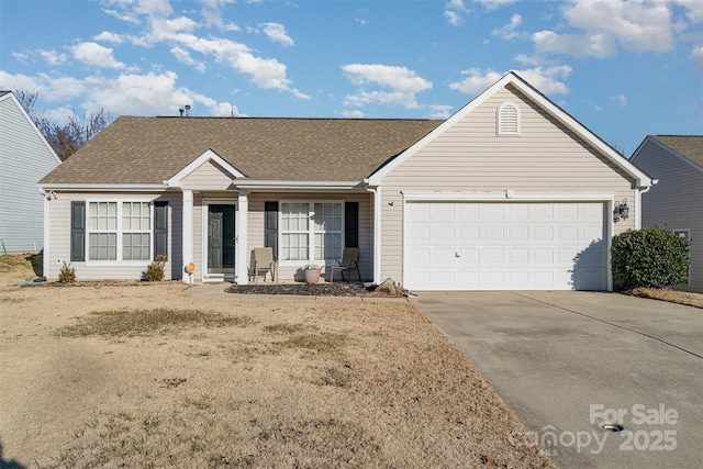 ranch-style home featuring a front lawn and a garage