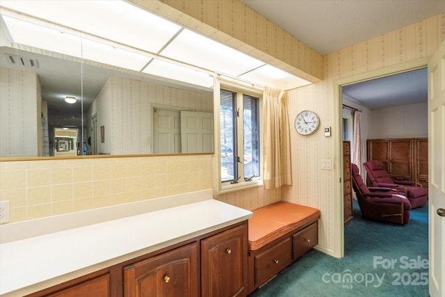 bathroom with visible vents and wallpapered walls