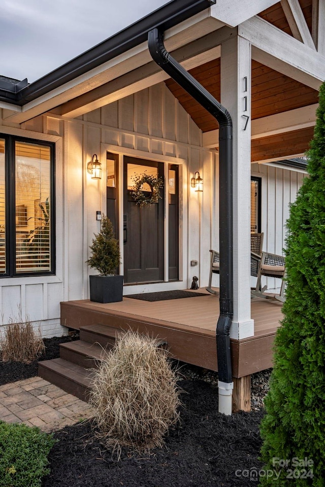 entrance to property with a porch