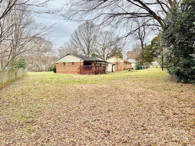 view of yard with a deck