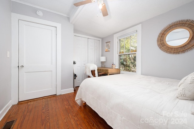 bedroom featuring lofted ceiling, ceiling fan, and dark wood-type flooring