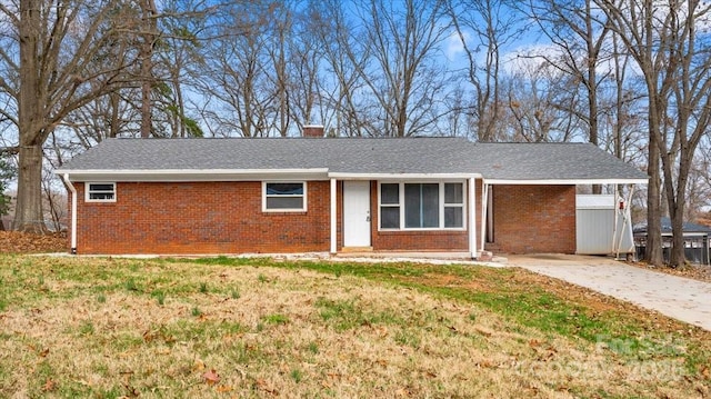 ranch-style home with a front lawn