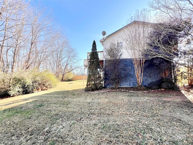 view of side of property featuring a yard