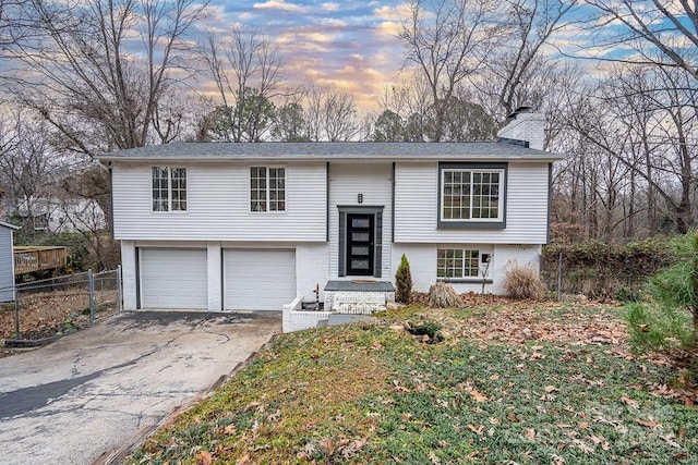 raised ranch with a garage