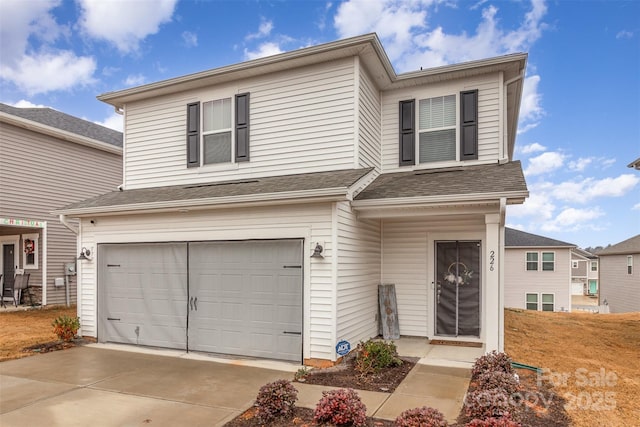 view of front of home with a garage