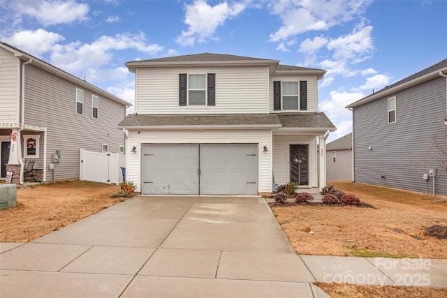 front of property featuring a garage