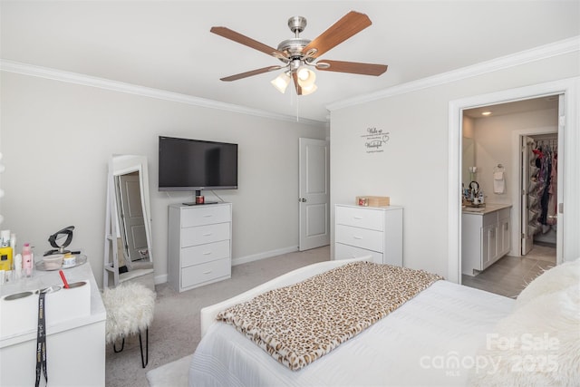 carpeted bedroom with ceiling fan and crown molding