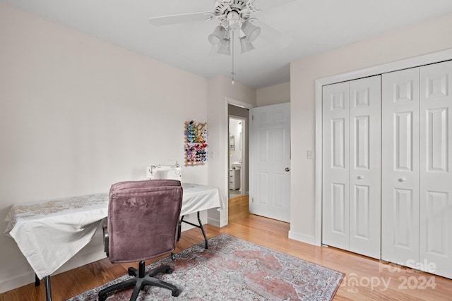 office area with ceiling fan and hardwood / wood-style flooring