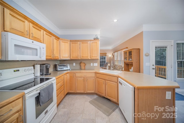 kitchen with white appliances, crown molding, kitchen peninsula, light brown cabinetry, and sink