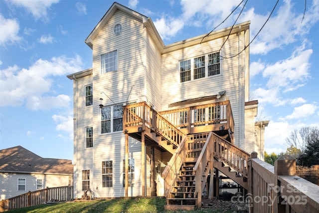 rear view of property with a deck