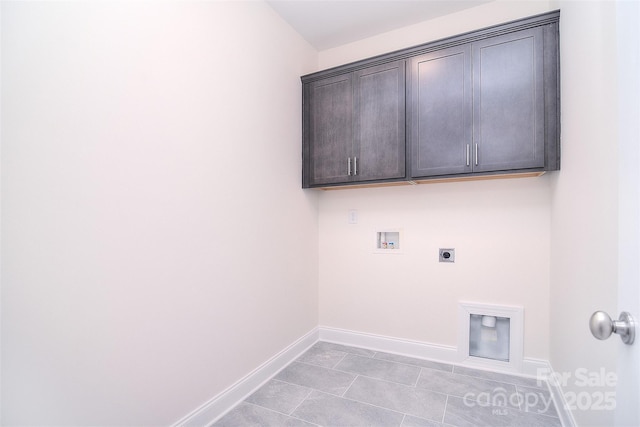 clothes washing area with light tile patterned floors, hookup for an electric dryer, washer hookup, baseboards, and cabinet space