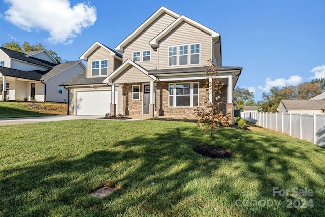 craftsman-style home with a front yard