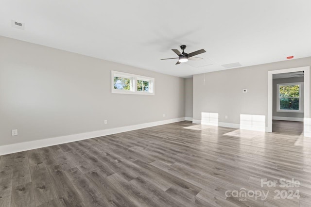 unfurnished room featuring hardwood / wood-style flooring and ceiling fan