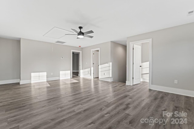 interior space featuring dark hardwood / wood-style flooring and ceiling fan