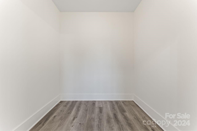 empty room featuring hardwood / wood-style flooring