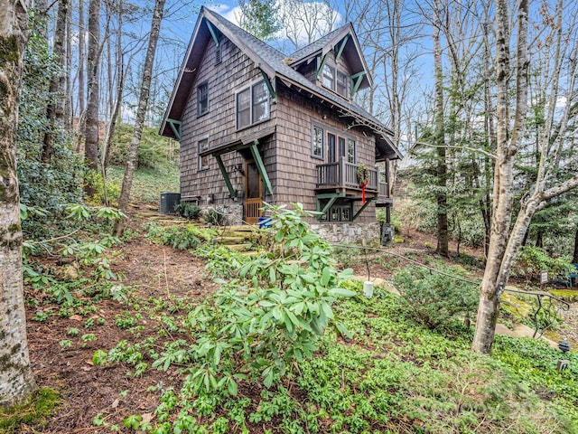 view of home's exterior with central AC