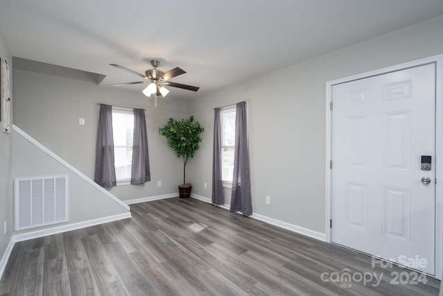 foyer entrance featuring ceiling fan and dark hardwood / wood-style flooring