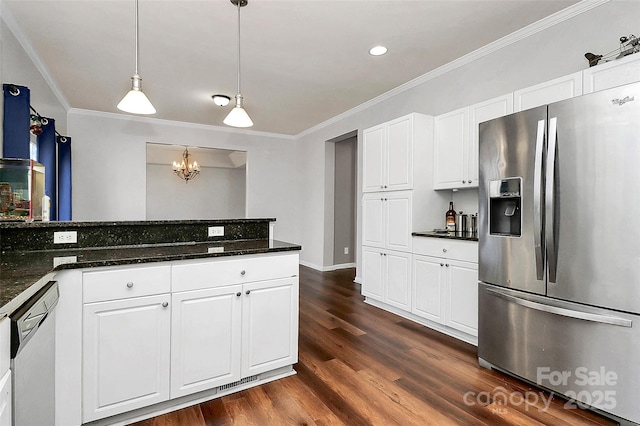 kitchen with decorative light fixtures, stainless steel fridge, white dishwasher, white cabinets, and dark stone counters