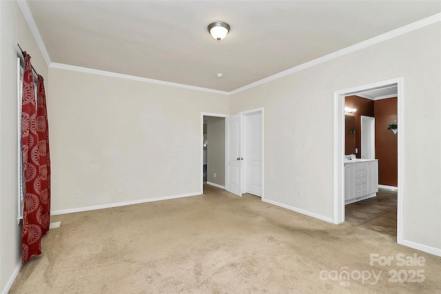 spare room featuring carpet floors and ornamental molding