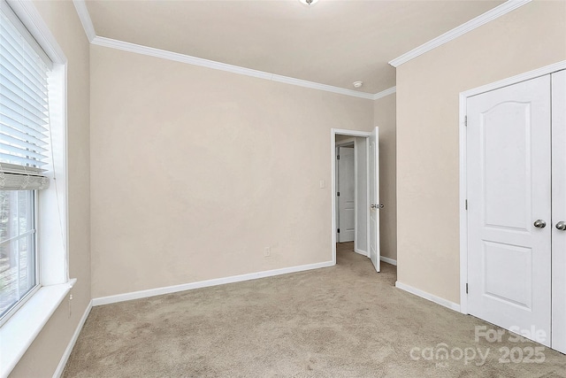 unfurnished bedroom with multiple windows, a closet, light carpet, and crown molding