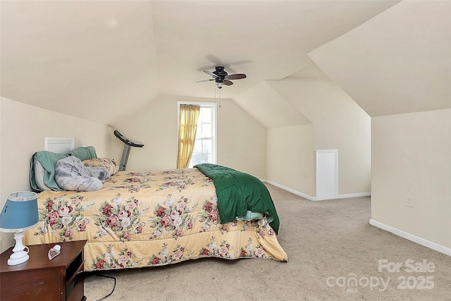 bedroom featuring lofted ceiling, light carpet, and ceiling fan