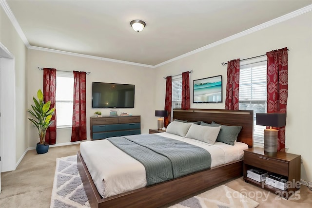 carpeted bedroom with ornamental molding