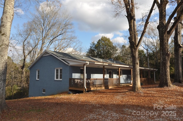 view of front of house featuring a deck