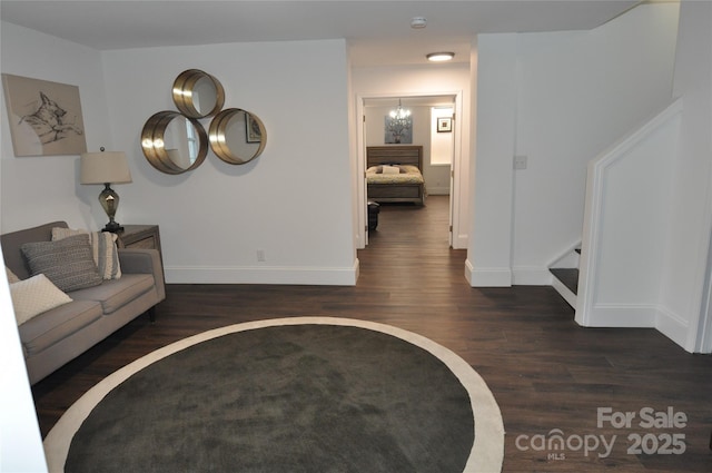 living room with dark hardwood / wood-style floors