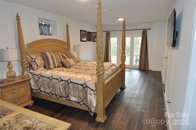 bedroom with dark hardwood / wood-style flooring, access to exterior, and french doors