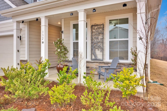 doorway to property with a porch