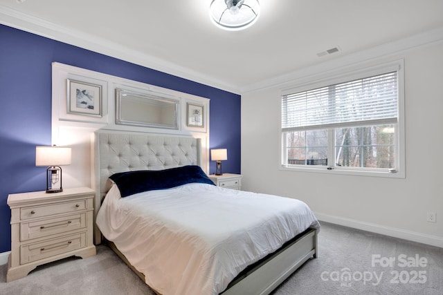 carpeted bedroom with crown molding