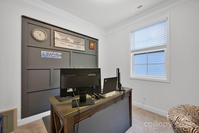 carpeted office space featuring crown molding