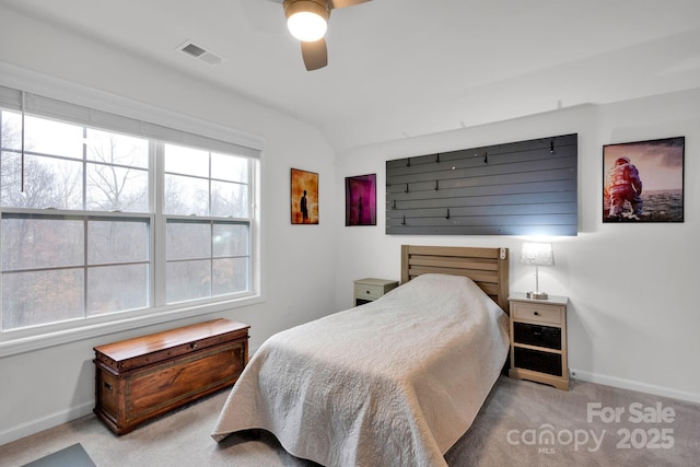 bedroom with light carpet and ceiling fan