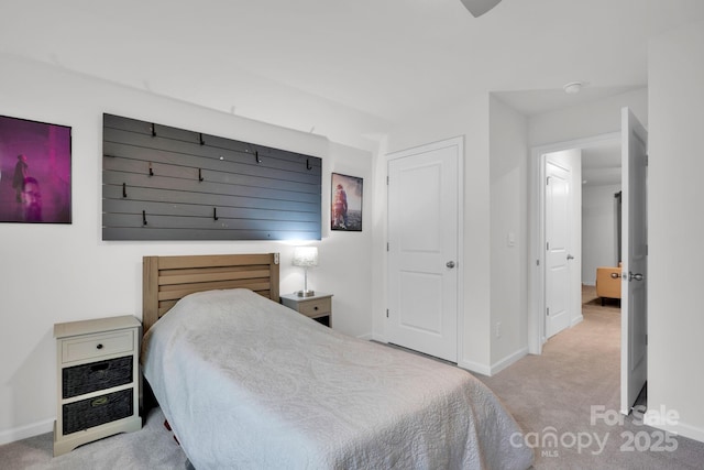 bedroom with light colored carpet