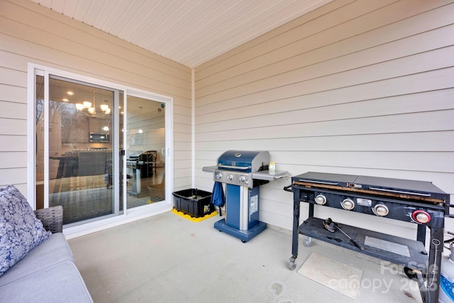 view of patio featuring a grill