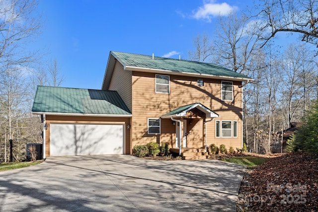 view of front of property with a garage