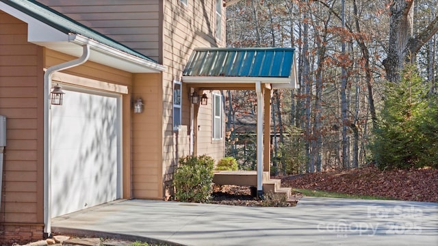 property entrance featuring a garage