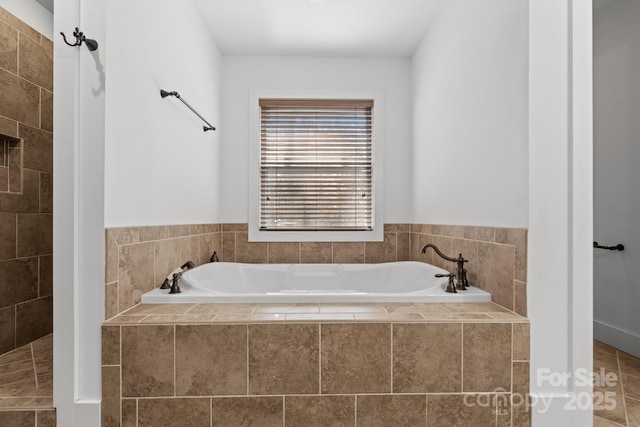 bathroom with separate shower and tub