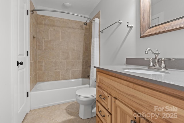 full bathroom with vanity, tile patterned floors, toilet, and shower / bath combo with shower curtain